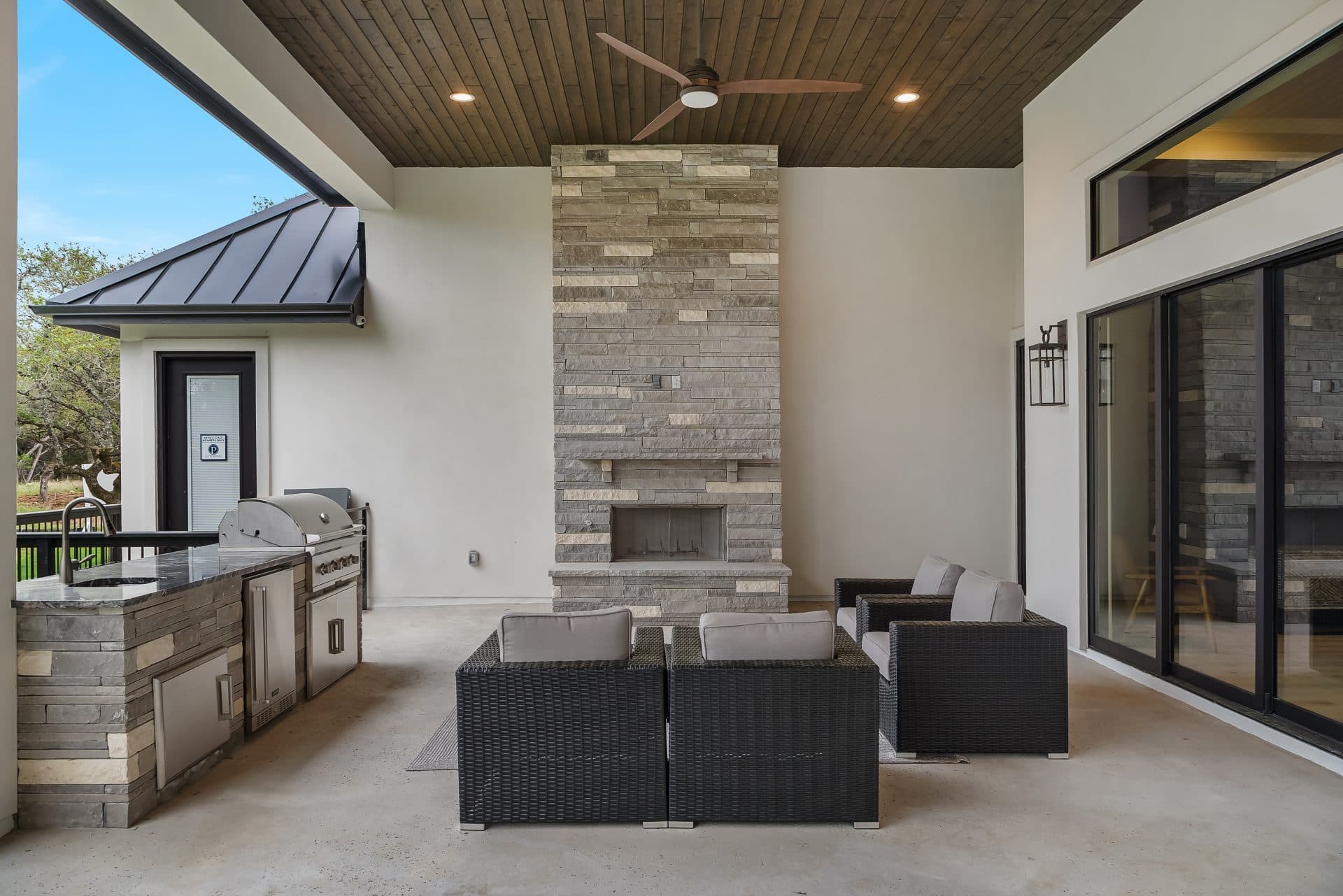 Covered outdoor living patio overlooking Hill Country views