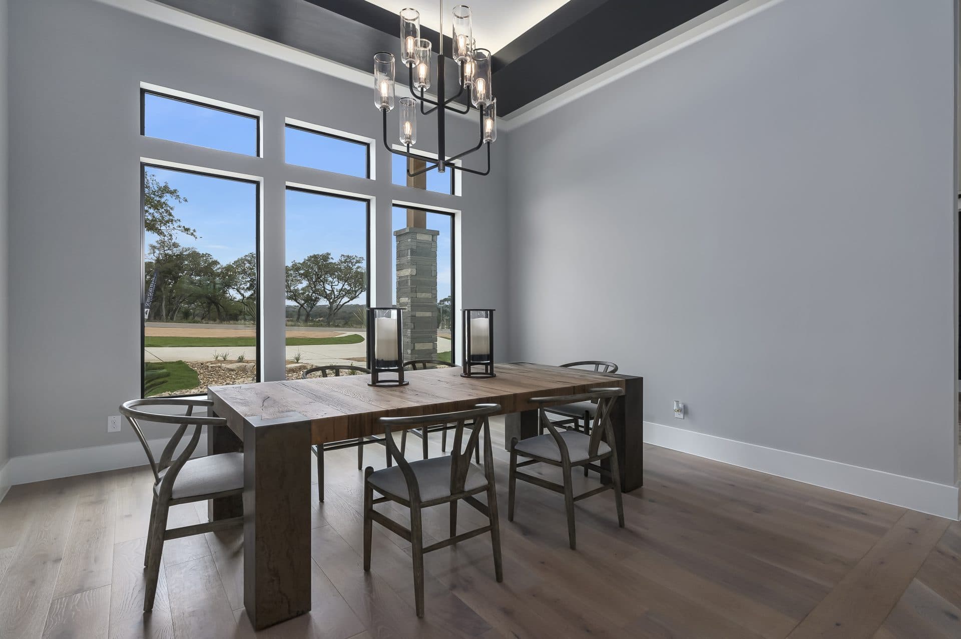 Elegant JLP dining room with designer lighting and refined trim details